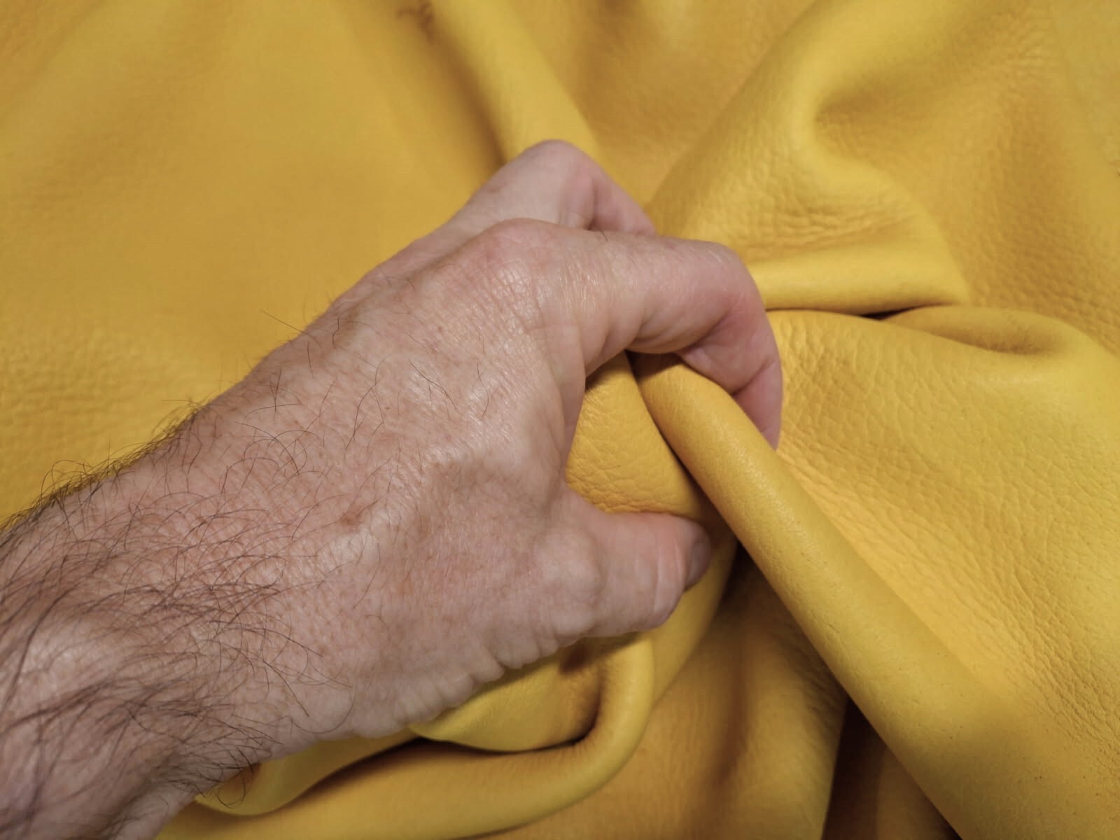 Elk leather hide showing flexibility and strength